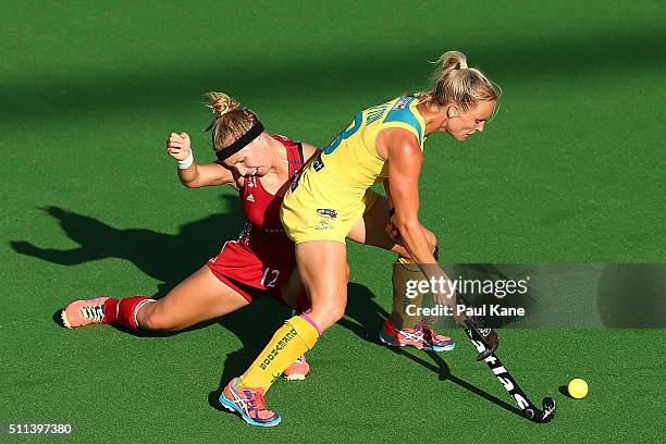 Jane Claxton of Australia and Sarah Robertson of Great Britain contest for the ball during the International Test match between the Australian...