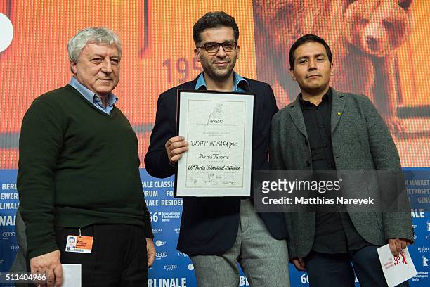Members of the Fipresci Jury pose together with award winner Danis Tanovic during the awards of the Independent Juries press conference as part of...