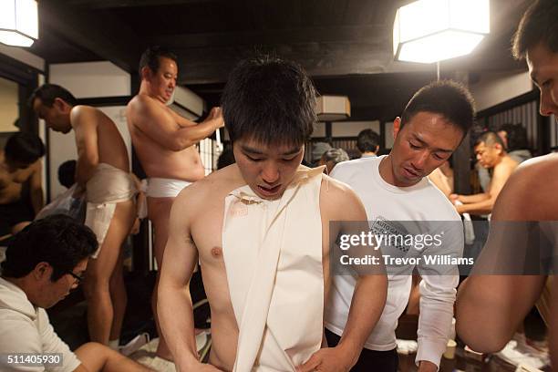 Men are fitted into loincloths at the Hadaka Matsuri, or Naked Festival at Saidaiji Temple on February 20, 2016 in Okayama, Japan. Some 9,000 men...