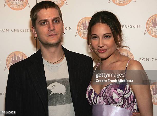 Singer Rob Thomas of "Matchbox Twenty" and his wife model Marisol Thomas attend the Sidewalk Angels Foundation Benefit on August 3, 2004 at the China...