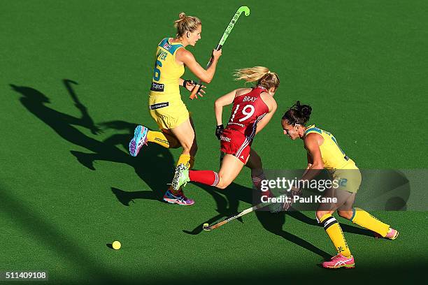 Madonna Blyth of Australia steals the ball from Sophie Bray of Great Britain during the International Test match between the Australian Hockeyroos...