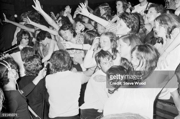 Fans of pop singer David Bowie at the last concert he performed in his Ziggy Stardust persona, at the Hammersmith Odeon, London, 3rd July 1973.