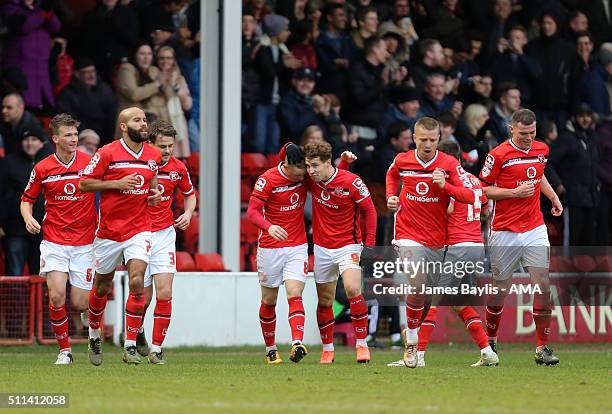 Sam Manton of Walsall celebrates with his team-mates after scoring a goal to make it 1-1 during the Sky Bet League One match between Walsall and...