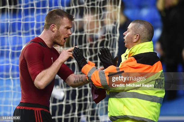 Chris Brunt of West Bromwich Albion reacts after being hit by an object during the Emirates FA Cup fifth round match between Reading and West...