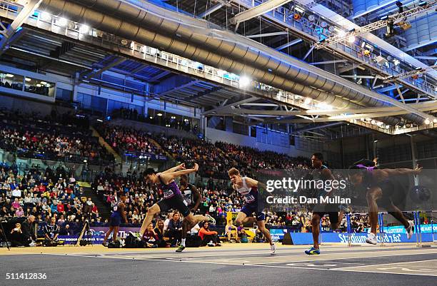 Wenjun Xie of China crosses the line to win the the Men's 60 metres hurdles final during the Glasgow Indoor Grand Prix at Emirates Arena on February...