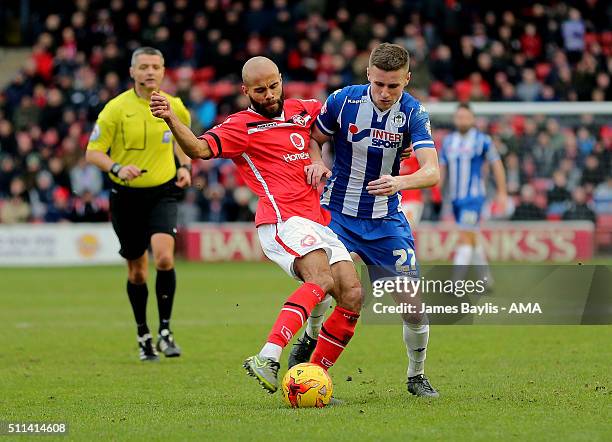 Adam Chambers of Walsall and Ryan Colclough of Wigan Athletic during the Sky Bet League One match between Walsall and Wigan Athletic at Bescot...