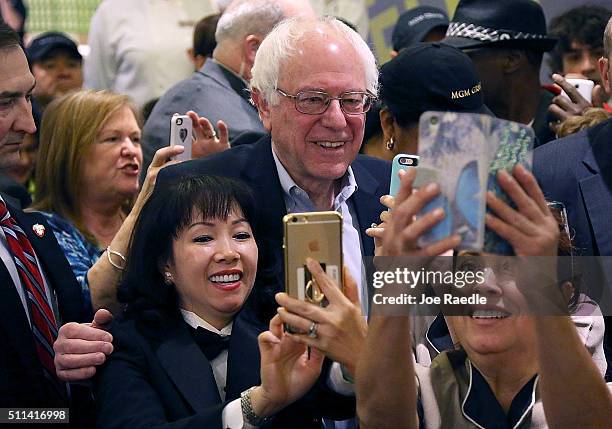 Democratic presidential candidate Sen. Bernie Sanders greets workers in the cafeteria of the MGM Grand Casino on February 20, 2016 in Las Vegas,...