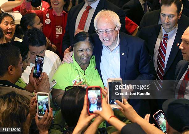 Democratic presidential candidate Sen. Bernie Sanders greets workers in the cafeteria of the MGM Grand Casino on February 20, 2016 in Las Vegas,...