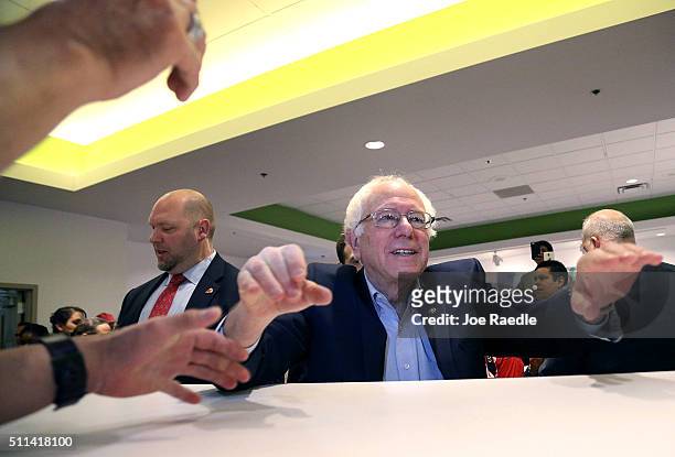 Democratic presidential candidate Sen. Bernie Sanders greets workers in the cafeteria of the MGM Grand Casino on February 20, 2016 in Las Vegas,...