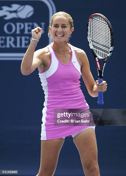 Gisela Dulko of Argentina celebrates as she plays against Elena Dementieva of Russia, during the second round of the Rogers Cup tennis on August 4,...