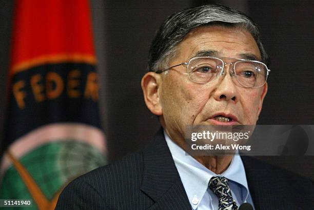 Secretary of Transportation Norman Mineta speaks to a group of airline executives during a meeting at the Federal Aviation Administration August 4,...