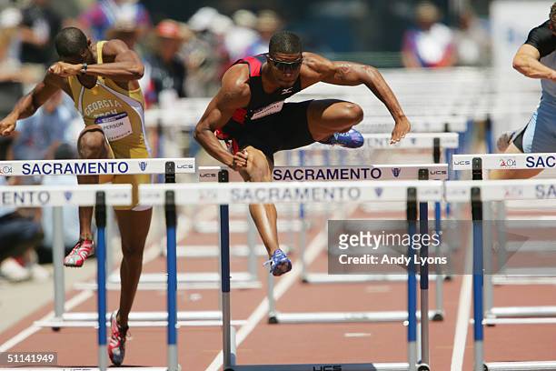 Terrence Trammell of Mizuno and Montrell Person of the Georgia Institute of Technology Rambling Wreck compete in the 110 Meter Hurdles during the...
