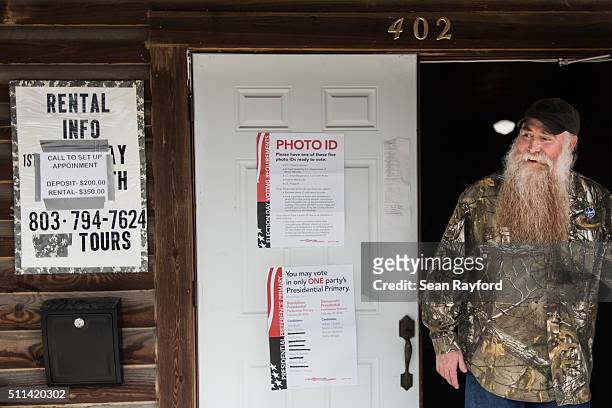 Carl Selander walks out of American Legion Memorial Cayce Post 130 after voting for Ted Cruz in the Republican presidential primary on February 20,...