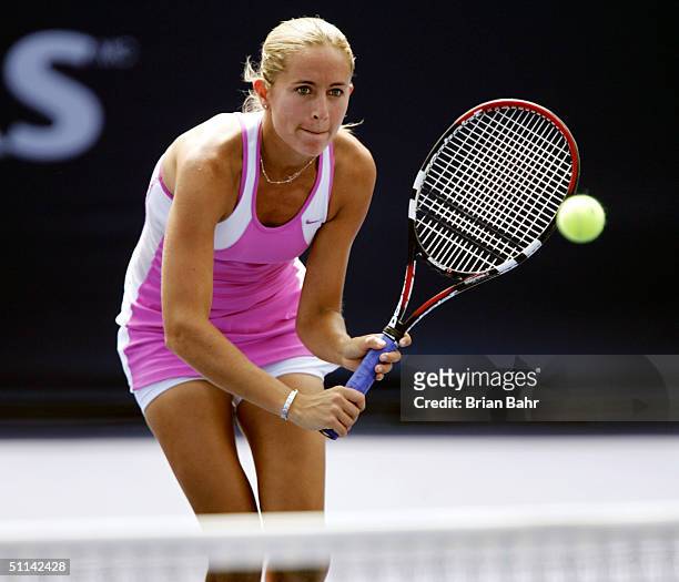 Gisela Dulko of Argentina drops a shot over the net against Elena Dementieva of Russia during the second round of the Rogers Cup tennis on August 4,...