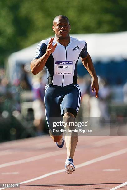 Maurice Greene of Adidas competes in the 100 Meter Dash during the U.S. Olympic Team Track & Field Trials on July 10, 2004 at the Alex G. Spanos...