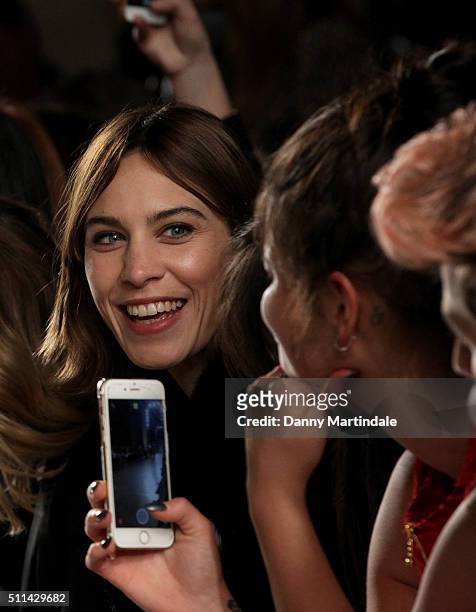 Alexa Chung, Pixie Geldof and Nick Grimshaw attends the House of Holland show during London Fashion Week Autumn/Winter 2016/17 at on February 20,...