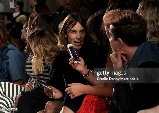 Alexa Chung, Pixie Geldof and Nick Grimshaw attends the House of Holland show during London Fashion Week Autumn/Winter 2016/17 at on February 20,...