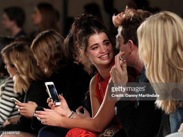 Pixie Geldof and Nick Grimshaw attends the House of Holland show during London Fashion Week Autumn/Winter 2016/17 at on February 20, 2016 in London,...