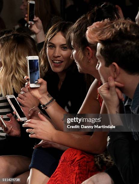 Alexa Chung, Pixie Geldof and Nick Grimshaw attends the House of Holland show during London Fashion Week Autumn/Winter 2016/17 at on February 20,...