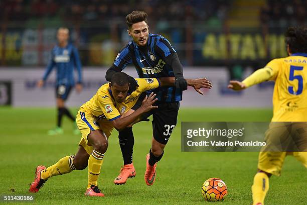 Danilo D'Ambrosio of FC Internazionale Milano is challenged by Lucas Martins Fernando of UC Sampdoria during the Serie A match between FC...