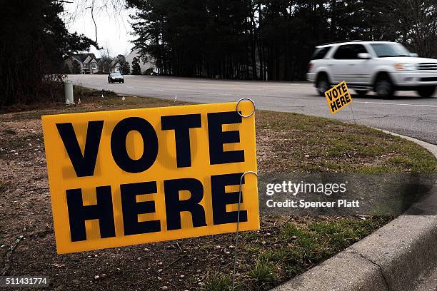 Sign sits in front of a polling station during the Republican presidential primary on February 20, 2016 in Little Mountain, South Carolina. Polls...