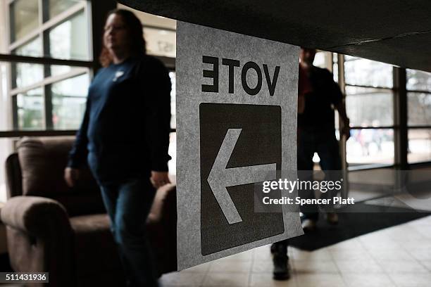 People vote in the Republican presidential primary on February 20, 2016 in Chapin, South Carolina. Polls show New York businessman Donald Trump...