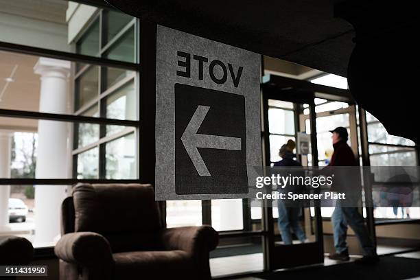 People vote in the Republican presidential primary on February 20, 2016 in Chapin, South Carolina. Polls show New York businessman Donald Trump...