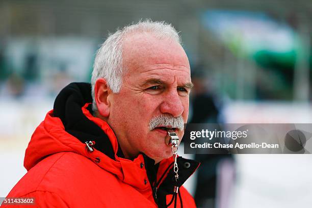 Joel Quenneville head coach of the Chicago Blackhawks looks on from the ice during practice day for the 2016 Coors Light Stadium Series game against...