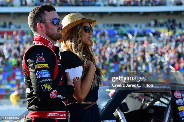Austin Dillon, driver of the Rheem Chevrolet, stands on the grid with his girlfriend, Whitney Ward, prior to the NASCAR XFINITY Series PowerShares...