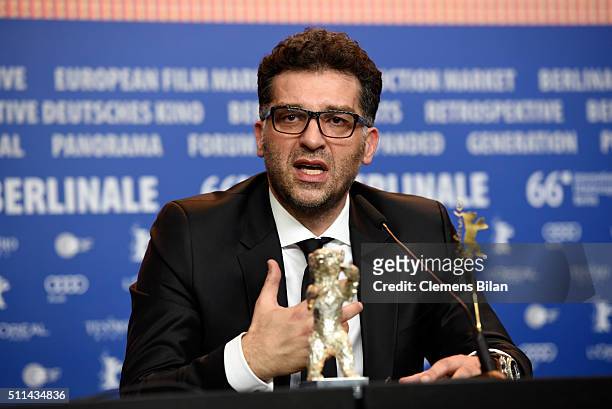 Director Danis Tanovic speaks after receiving the Silver Bear Grand Jury Prize trophy for his film 'Death in Sarajevo' during the award winners press...