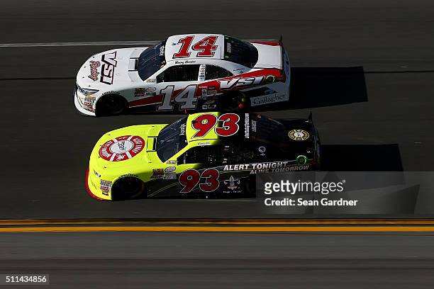 Benny Gordon, driver of the Toyota, races Scott Lagasse Jr, driver of the Alert Today Florida Chevrolet, during the NASCAR XFINITY Series PowerShares...