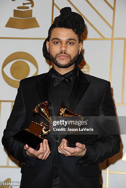 The Weeknd poses in the press room at the The 58th GRAMMY Awards at Staples Center on February 15, 2016 in Los Angeles, California.