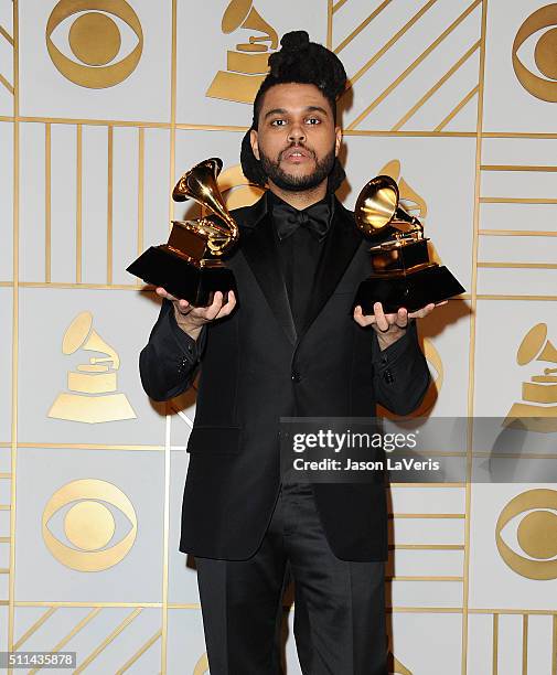 The Weeknd poses in the press room at the The 58th GRAMMY Awards at Staples Center on February 15, 2016 in Los Angeles, California.