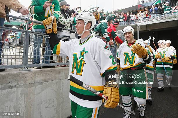 Antti Laaksonen and Darby Hendrickson of the Minnesota North Stars/Wild make their way to the ice prior to the the Coors Light NHL Stadium Series...