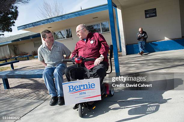 Tony and Leigh Ratiner wait outside Swope Middle School February 20, 2016 in Reno, Nevada. Former Secretary of State Hillary Clinton was projected to...