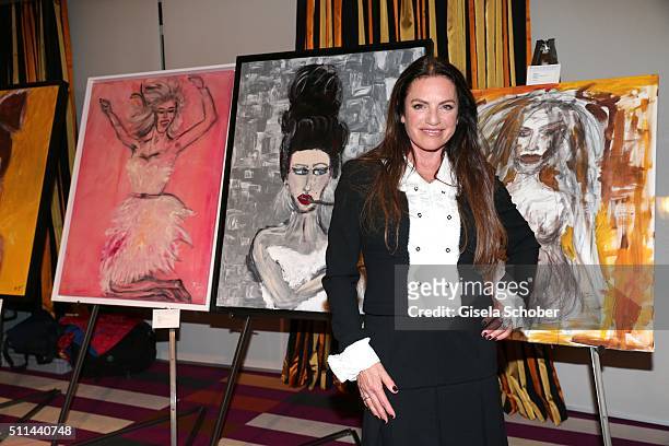 Christine Neubauer in front of her paintings during the 'Christine Neubauer Hautnah' exhibition opening at Hotel Vier Jahreszeiten on February 20,...