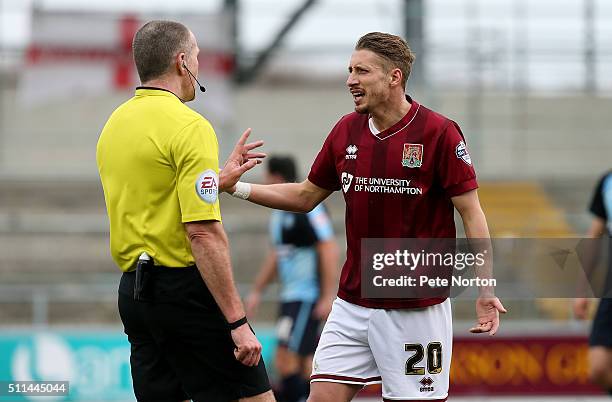 Referee Graham Sailisbury talks to Lee Martin of Northampton Town during the Sky Bet League Two match between Northampton Town and Wycombe Wanderers...