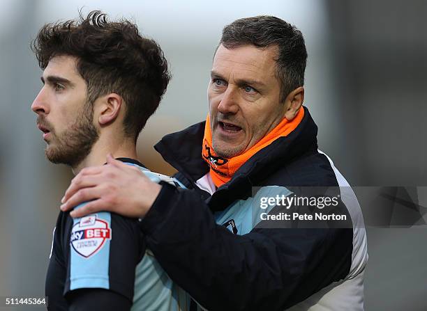 Wycombe Wanderers assistant manager Barry Richardson gives instruction to Max Kretzschmar prior to coming on as a substitute during the Sky Bet...