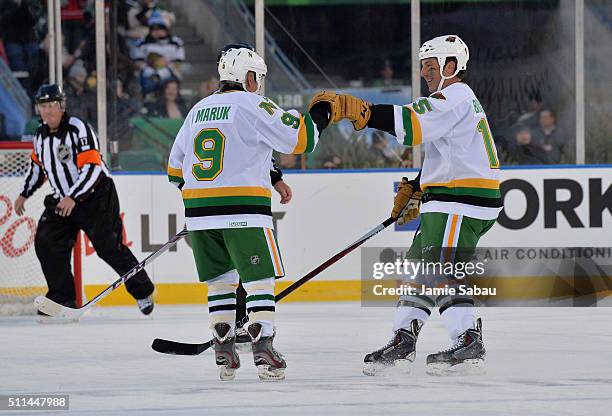 Andrew Brunette of the Minnesota North Stars/Wild Alumni celebrates his penalty shot goal with teammate Dennis Maruk during the 2016 Coors Light...