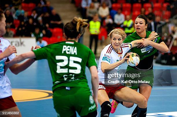 Gro Hammerseng-Edin of Larvik HK wrestles her way trough the defence during the Women's EHF Champions league game between Larvik HK and FTC-Rail...