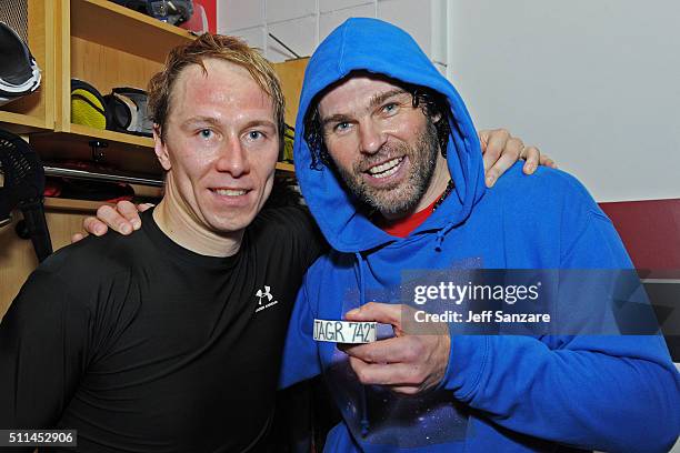 Jussi Jokinen of the Florida Panthers poses with teammate Jaromir Jagr after the game against the Winnipeg Jets at the BB&T Center on February 20,...