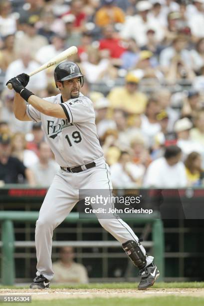 Mike Lowell of the Florida Marlins bats during the game against the Pittsburgh Pirates at PNC Park on July 18, 2004 in Pittsburgh, Pennsylvania. The...