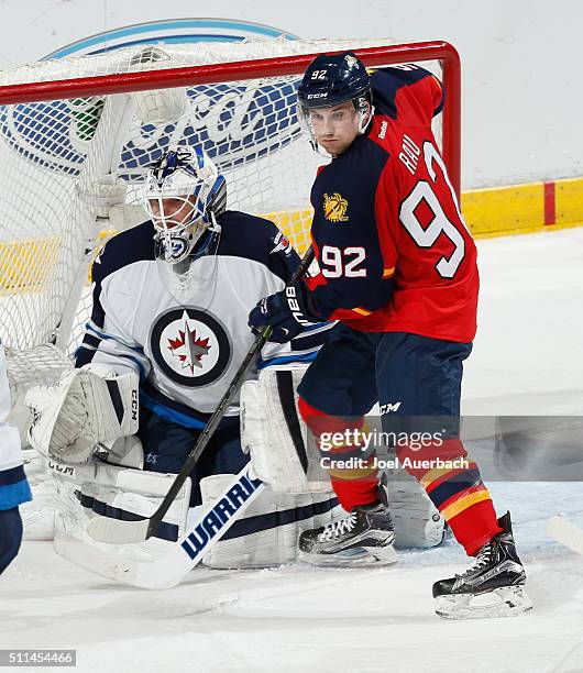 Kyle Rau of the Florida Panthers gets into position in front of Grant Clitsome of the Winnipeg Jets during third period action at the BB&T Center on...
