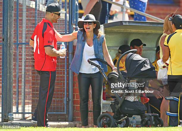 Michelle Bridges with her baby Axel in his pram talks with Steve Willis, also known as The Commando during the Medibank Melbourne Celebrity Twenty20...