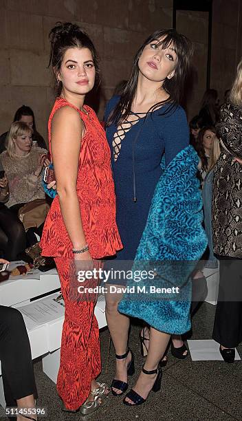 Pixie Geldof and Daisy Lowe attend the House of Holland show during London Fashion Week Autumn/Winter 2016/17 at TopShop Show Space on February 20,...