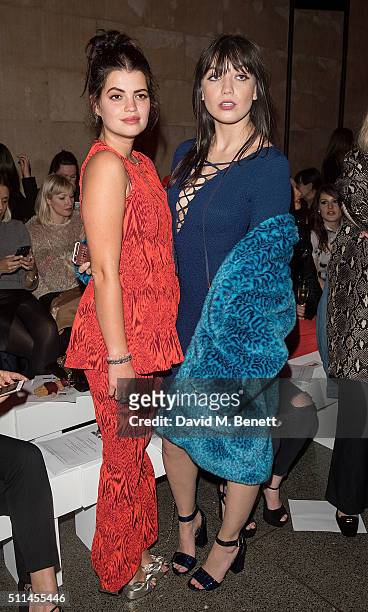 Pixie Geldof and Daisy Lowe attend the House of Holland show during London Fashion Week Autumn/Winter 2016/17 at TopShop Show Space on February 20,...