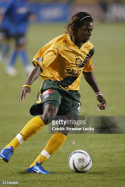Joseph Ngwenya of the Los Angeles Galaxy advances the ball against the San Jose Earthquakes during the game at the Home Depot Center on July 4, 2004...