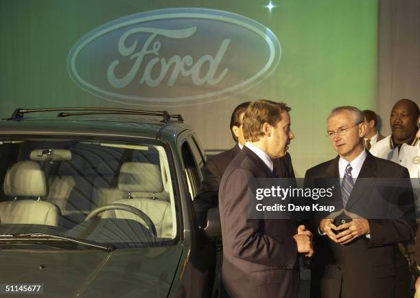 Missouri Govenor Bob Holden talks with Bill Ford, Chairman and CEO of Ford Motor Company, after Ford announced the production launch of the 2005 Ford...