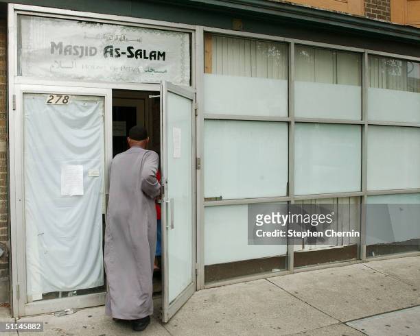 Man enters the Masjid As-Salam Mosque, August 5, 2004 in Albany, New York. Two men from Albany, identified as Yassin Muhiddin Aref and Mohammed...