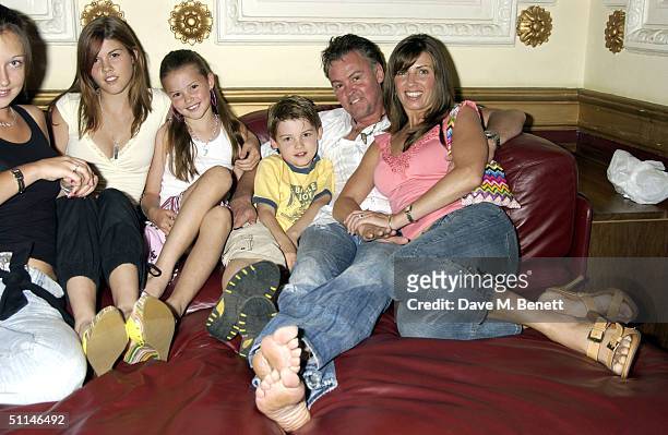 Paul Young and Stacey Young attend a charity auction and preview screening of the new film "13 Going On 30" on August 5, 2004 at the Electric Cinema,...